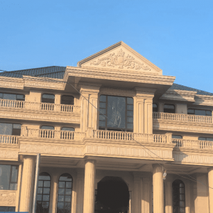 玉林黄金麻别墅外墙干挂石材效果示例