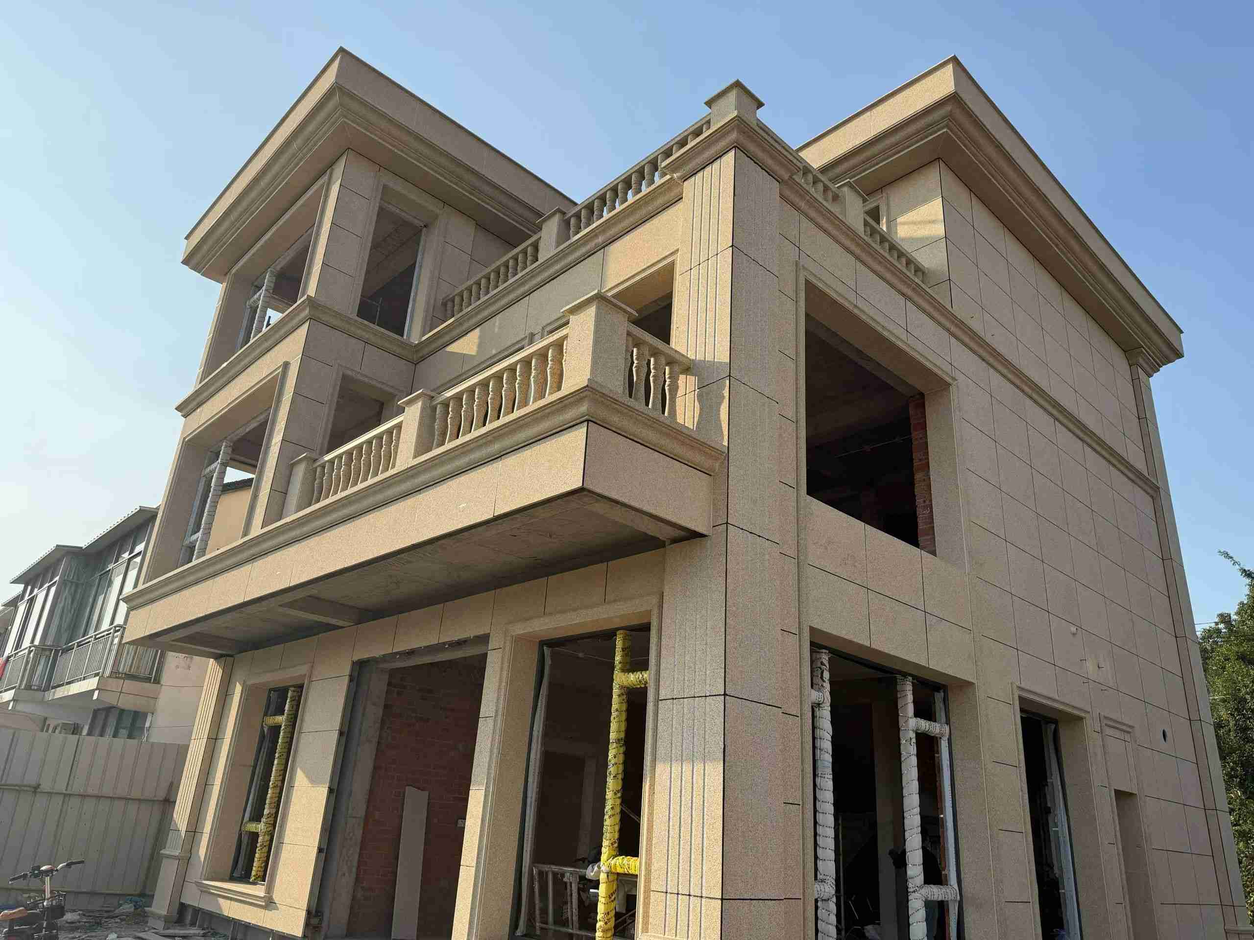 玉林 黄金麻花岗岩石材荔枝面外墙干挂效果展示